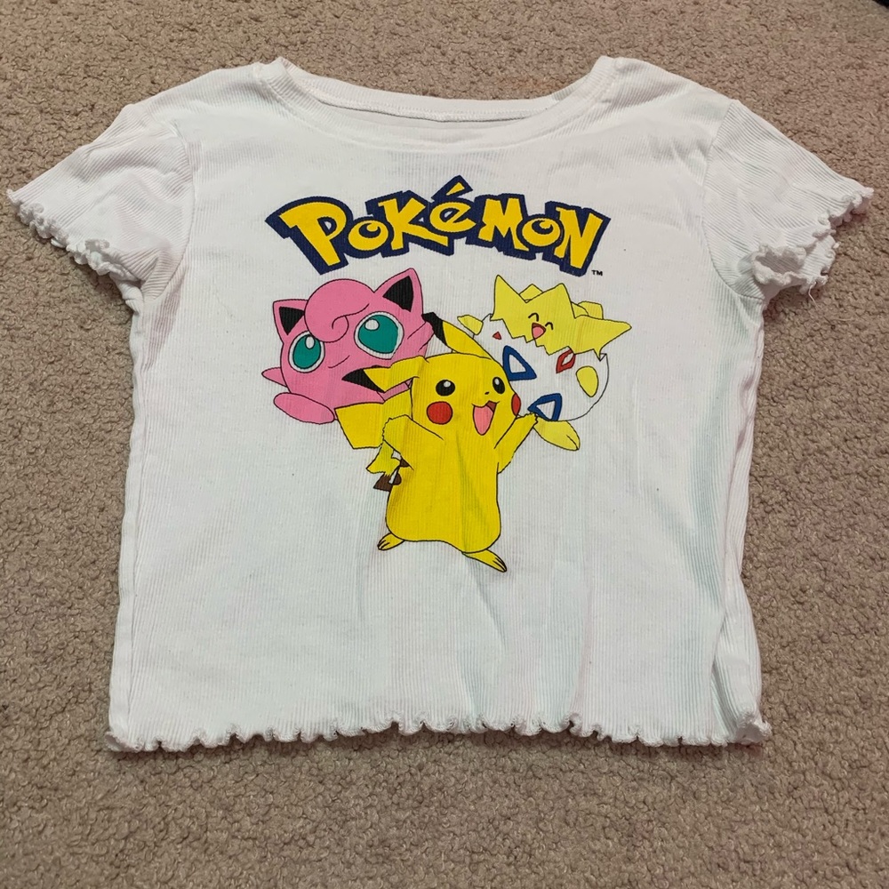 Short sleeve white crop top.